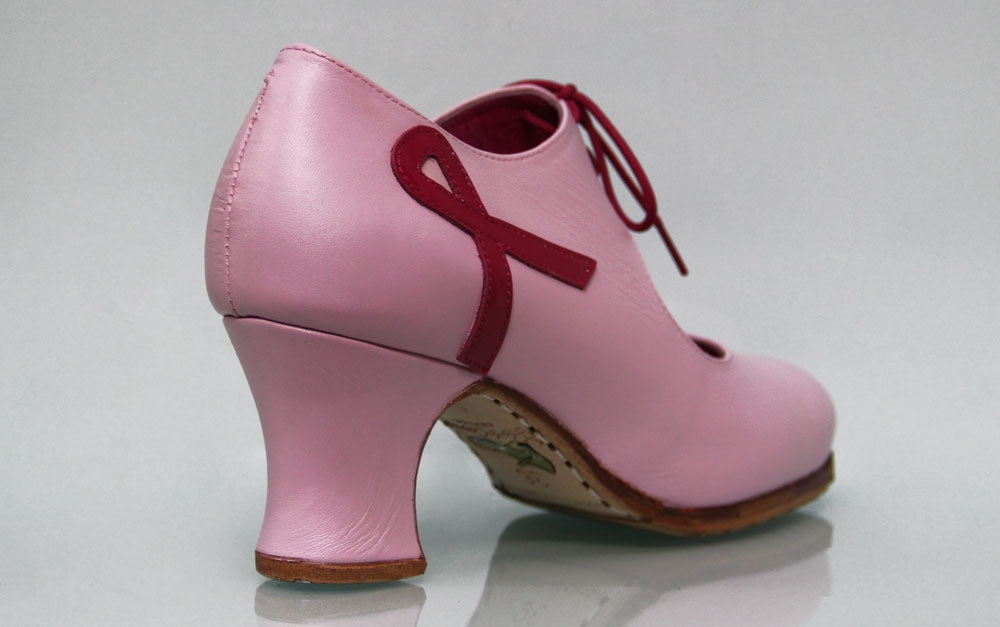 Modelo solidario tacón carrete