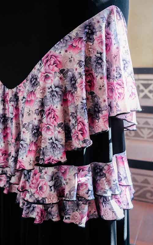 Black flamenco skirt with floral print ruffles in the center