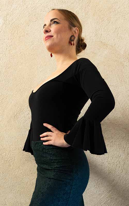 Black stretch knit flamenco top