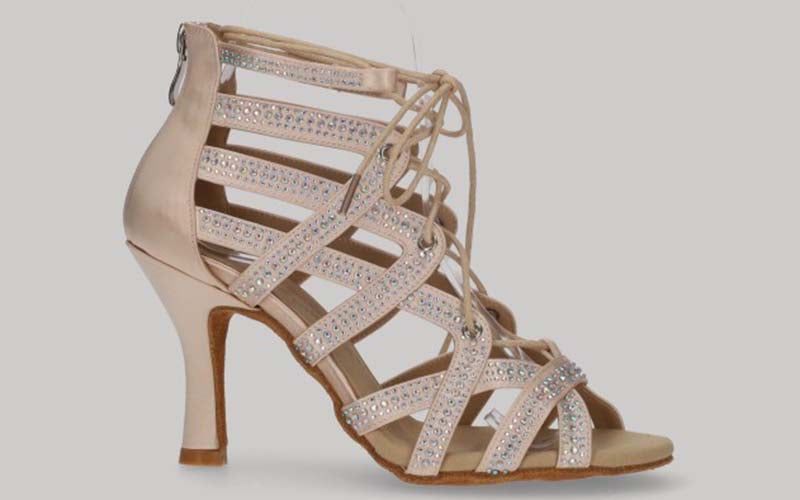 Pink ballroom ankle boot with crystal rhinestone cross-over straps, laces, and zipper closure at the heel