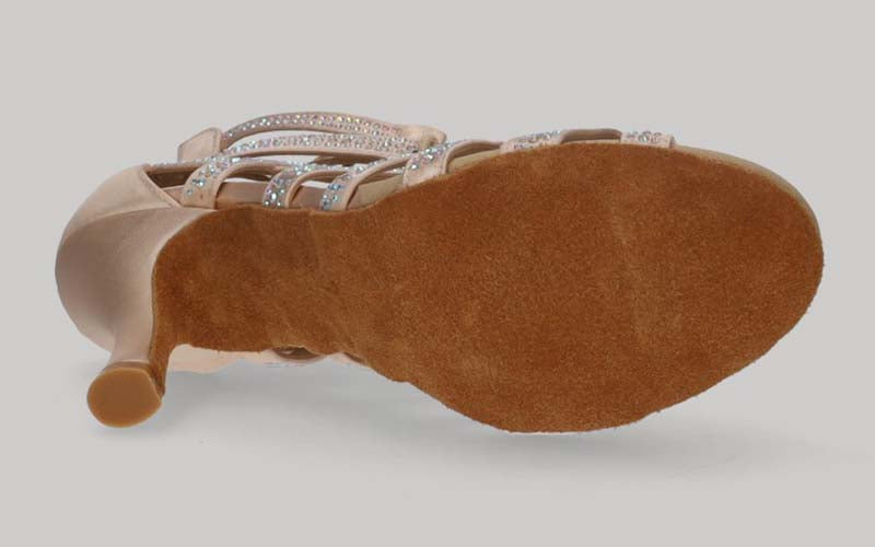 Pink ballroom ankle boot with crystal rhinestone cross-over straps, laces, and zipper closure at the heel