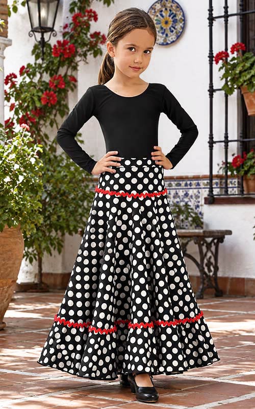 Falda flamenco de niña negra con lunares blancos y adorno rojo