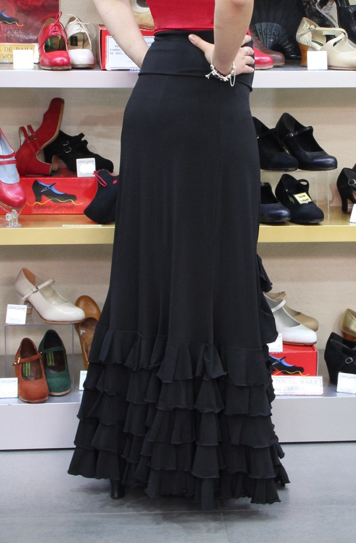 Falda flamenco negra con cinco volantes y apertura