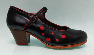 Professional flamenco dance shoe in black leather with red polka dots