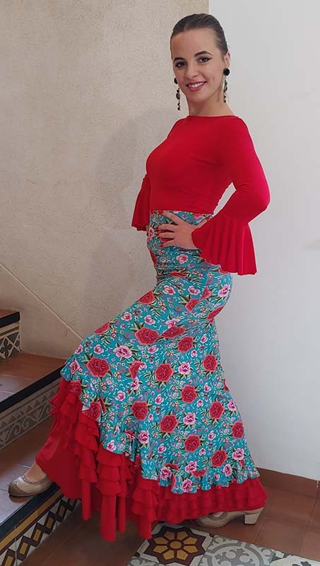 Jupe de flamenco imprimée de fleurs colorées et de volants rouges