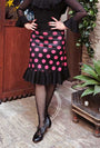 Falda flamenco corta de punto seda negra con lunares fucsia