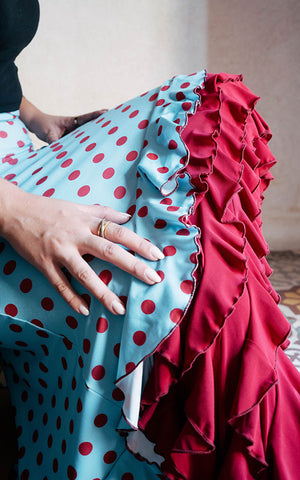Light blue flamenco skirt with red polka dots and red ruffles at the hem