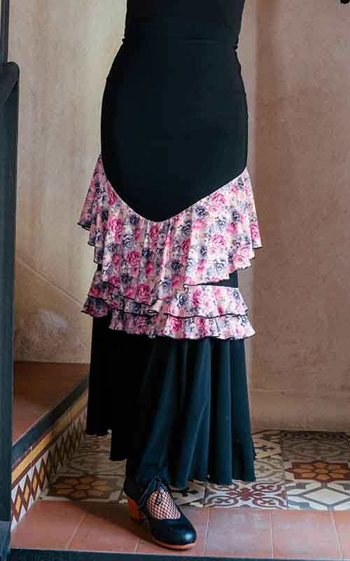Black flamenco skirt with floral print ruffles in the center