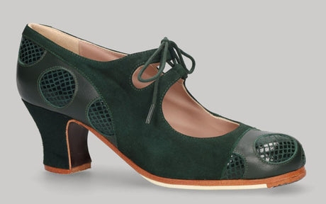 Chaussure de danse flamenco professionnelle associant cuir vert bouteille et daim à imprimé serpent noir.