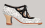 Professional flamenco dance shoe combining a white carnation pattern and black suede embellishments