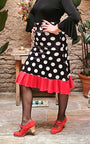Falda flamenco corta  negra con lunares blancos y volante rojo