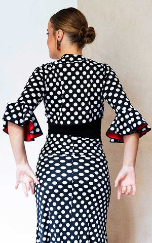 Cárdigan flamenco de punto elástico negro con lunares blancos