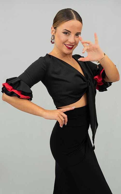 Black stretch knit flamenco cardigan with black and red ruffled 3/4 sleeves