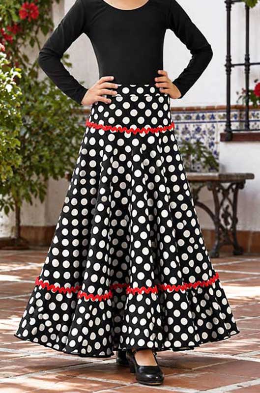 Falda flamenco de niña negra con lunares blancos y adorno rojo