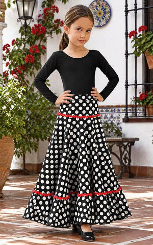 Falda flamenco de niña negra con lunares blancos y adorno rojo