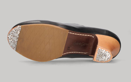 Zapato de baile flamenco profesional piel negro con adorno estrella y luna en blanco