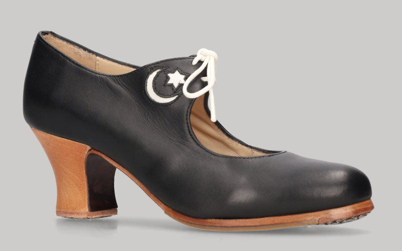 Zapato de baile flamenco profesional piel negro con adorno estrella y luna en blanco