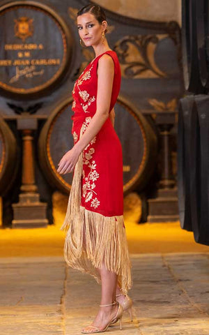 Robe Espagne rouge corail avec broderies et franges beiges