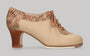 Professional flamenco dance shoe combining beige leather and snake print with laces